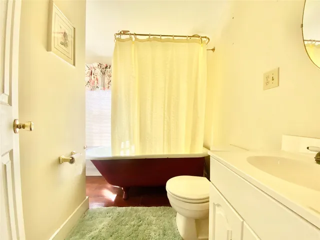 a bathroom with a sink and a toilet