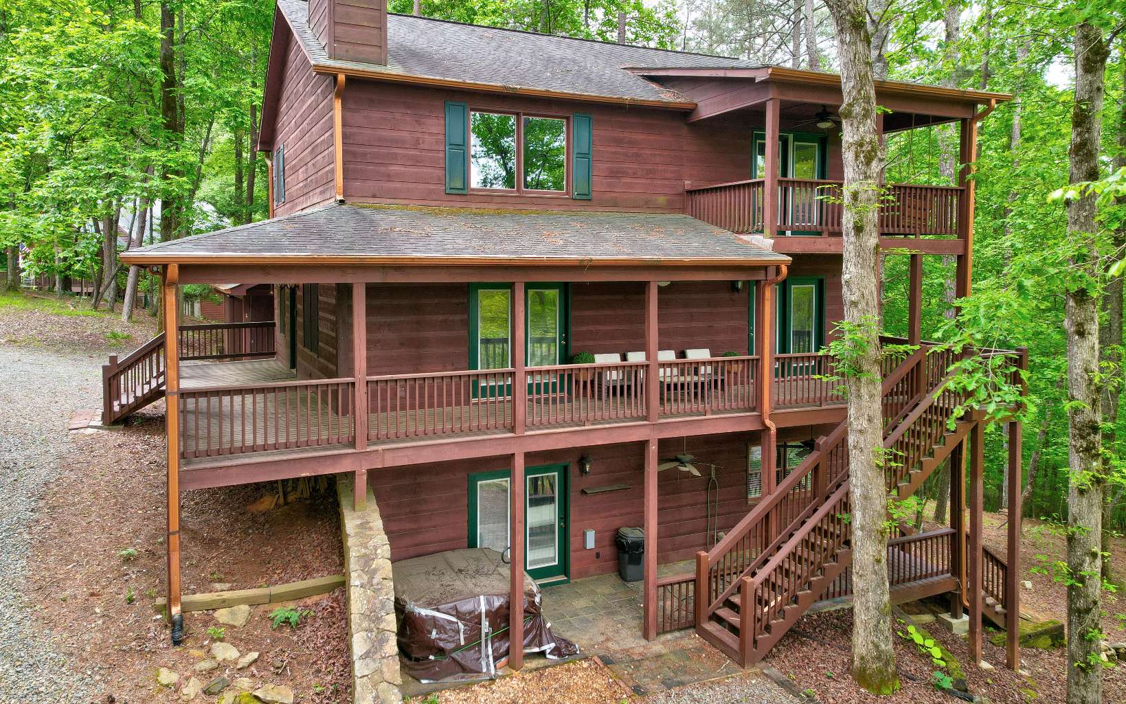 22 Kings Court Ellijay, GA 30540 - Photo 12 of 54 a view of a house with a balcony