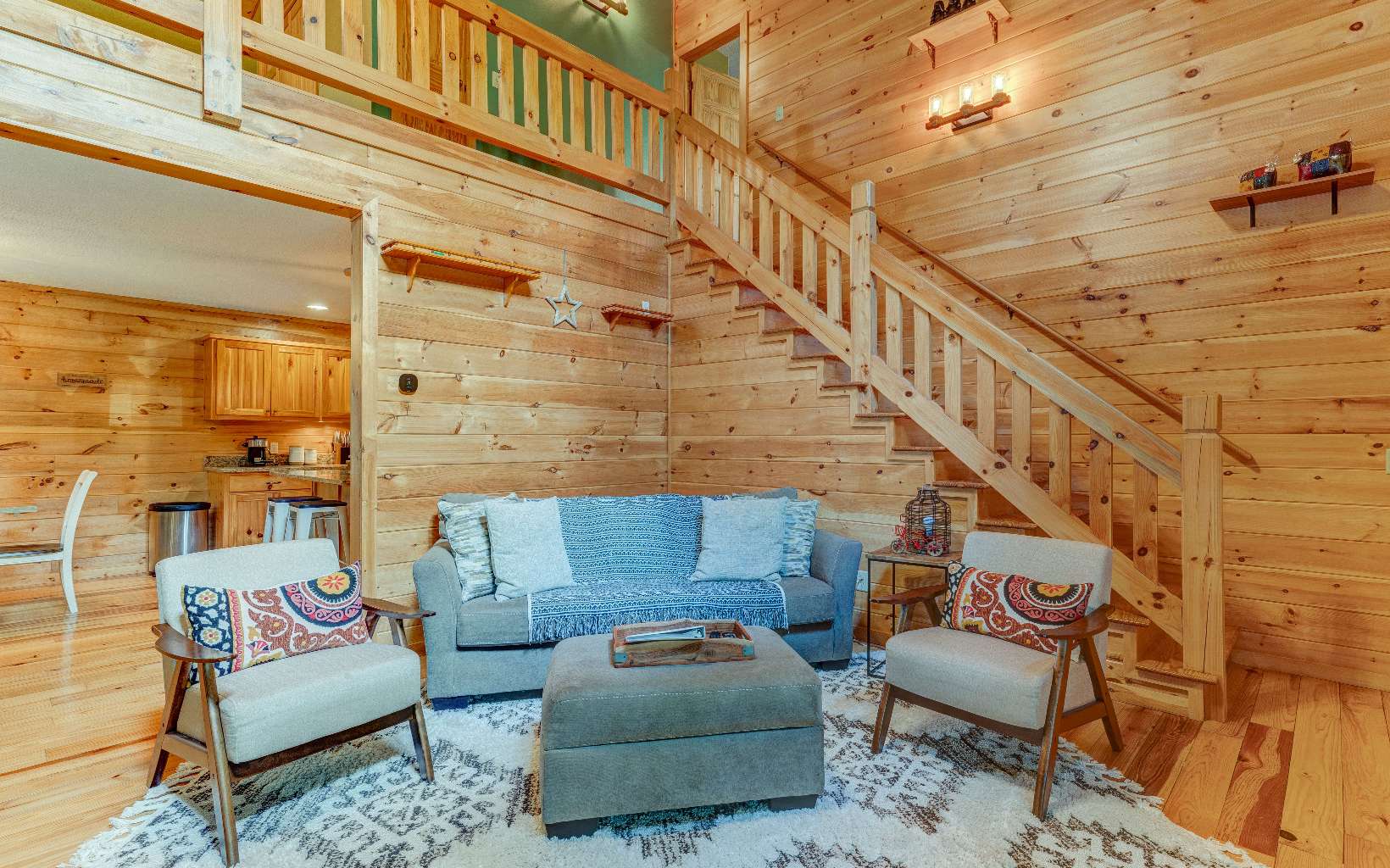 22 Kings Court Ellijay, GA 30540 - Photo 23 of 54 a living room with furniture and a ceiling fan