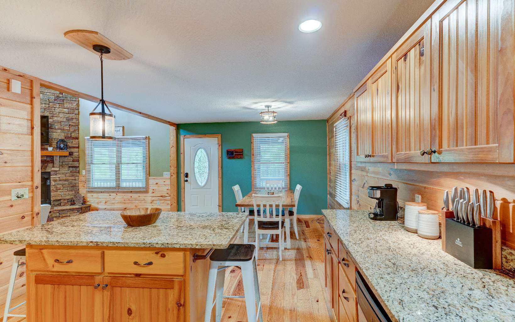 22 Kings Court Ellijay, GA 30540 - Photo 27 of 54 a kitchen with granite countertop a sink a counter top space and cabinets