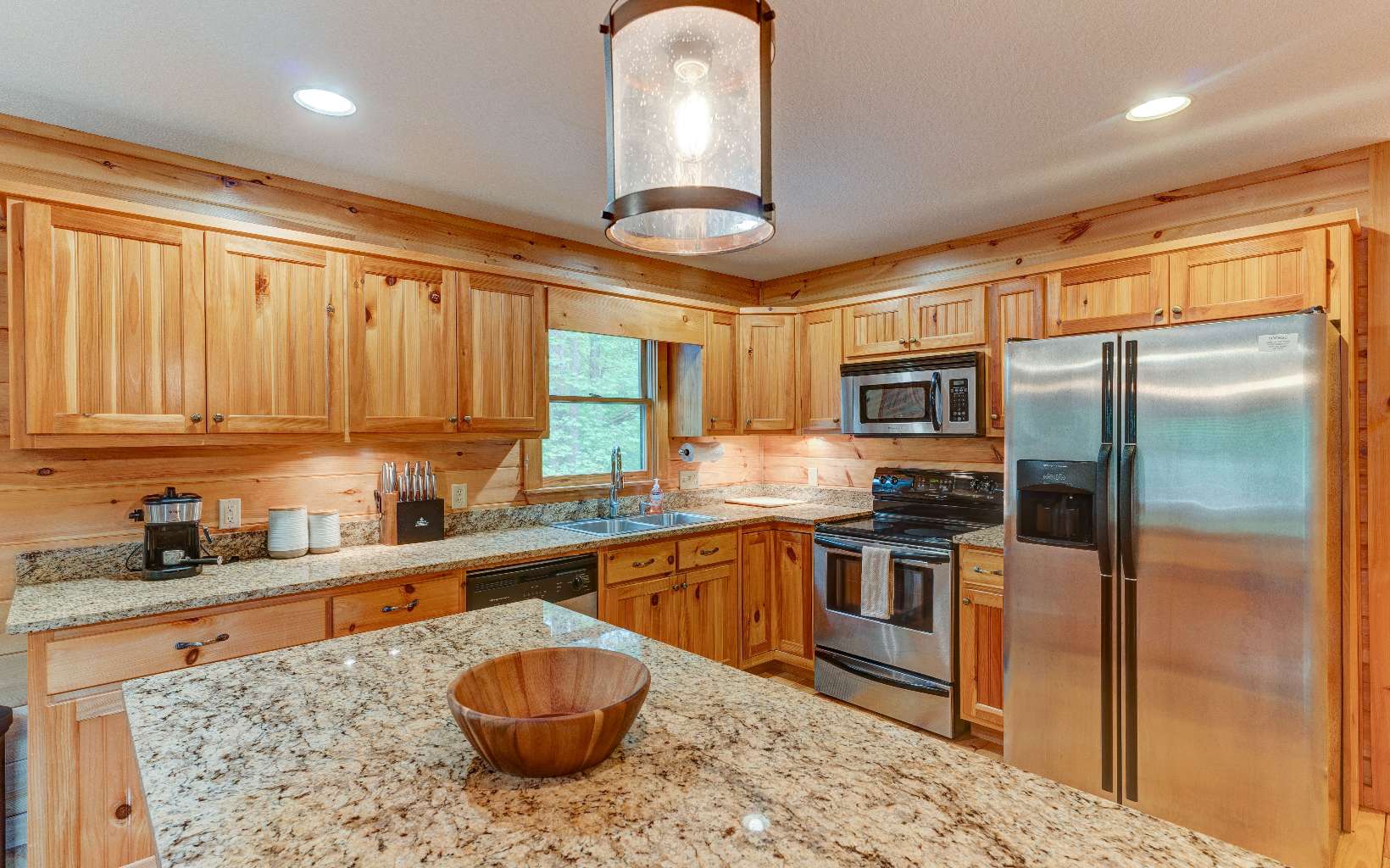 22 Kings Court Ellijay, GA 30540 - Photo 3 of 54 a kitchen with stainless steel appliances granite countertop a sink a stove and a refrigerator