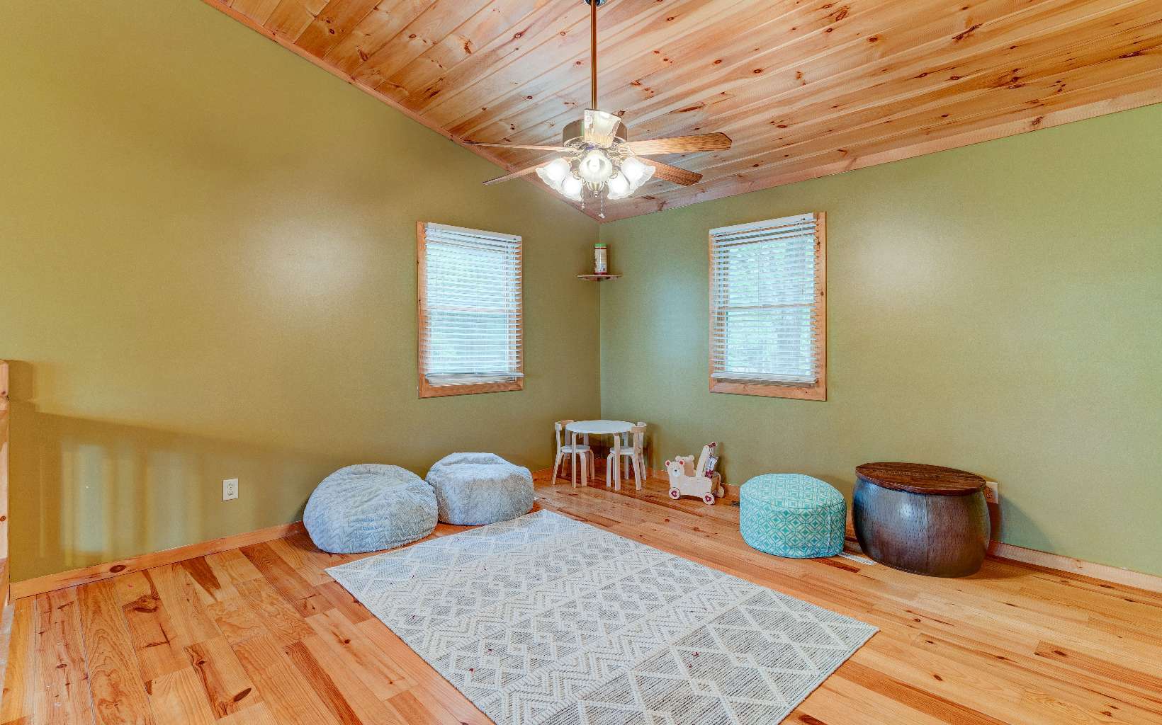 22 Kings Court Ellijay, GA 30540 - Photo 32 of 54 a bedroom with a bed and wooden floor
