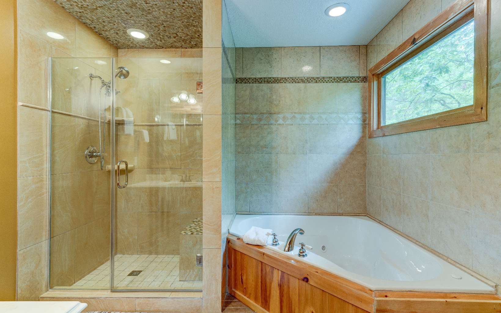 22 Kings Court Ellijay, GA 30540 - Photo 35 of 54 a bathroom with a bathtub and shower