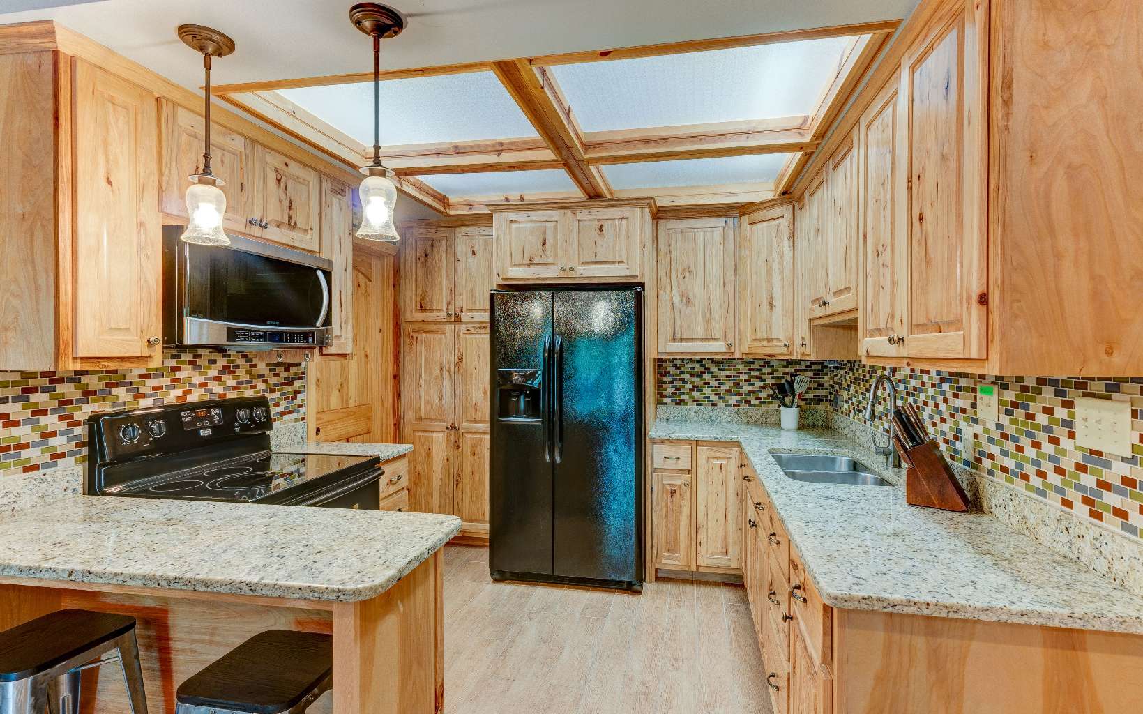 22 Kings Court Ellijay, GA 30540 - Photo 40 of 54 a kitchen with a sink stove and refrigerator
