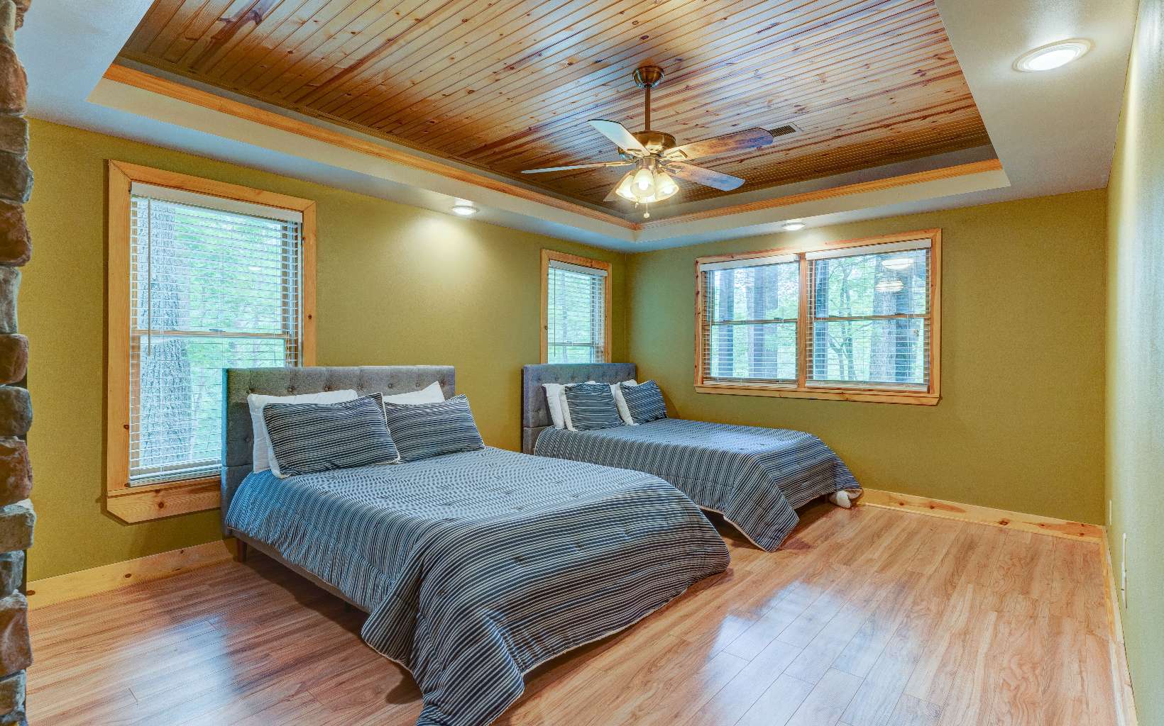 22 Kings Court Ellijay, GA 30540 - Photo 48 of 54 a bedroom with bed and wooden floor
