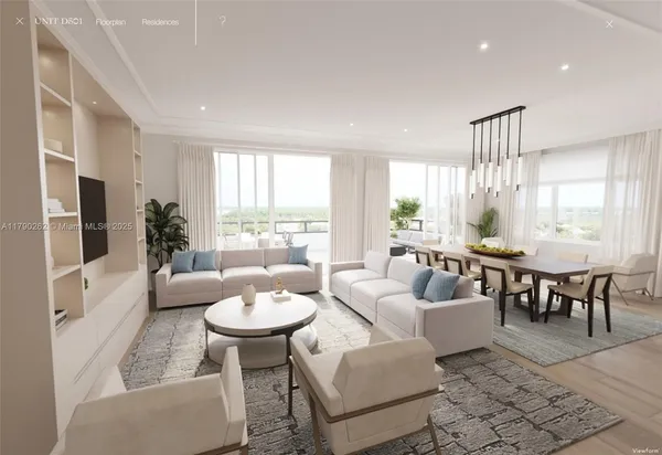 a living room with furniture a table and a large window