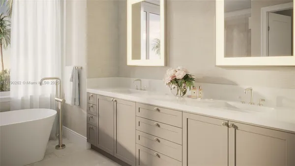 a bathroom with a granite countertop sink mirror and a bathtub