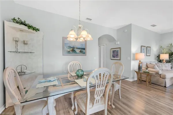 a view of a dining room with furniture