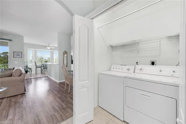 a view of livingroom with washer and dryer