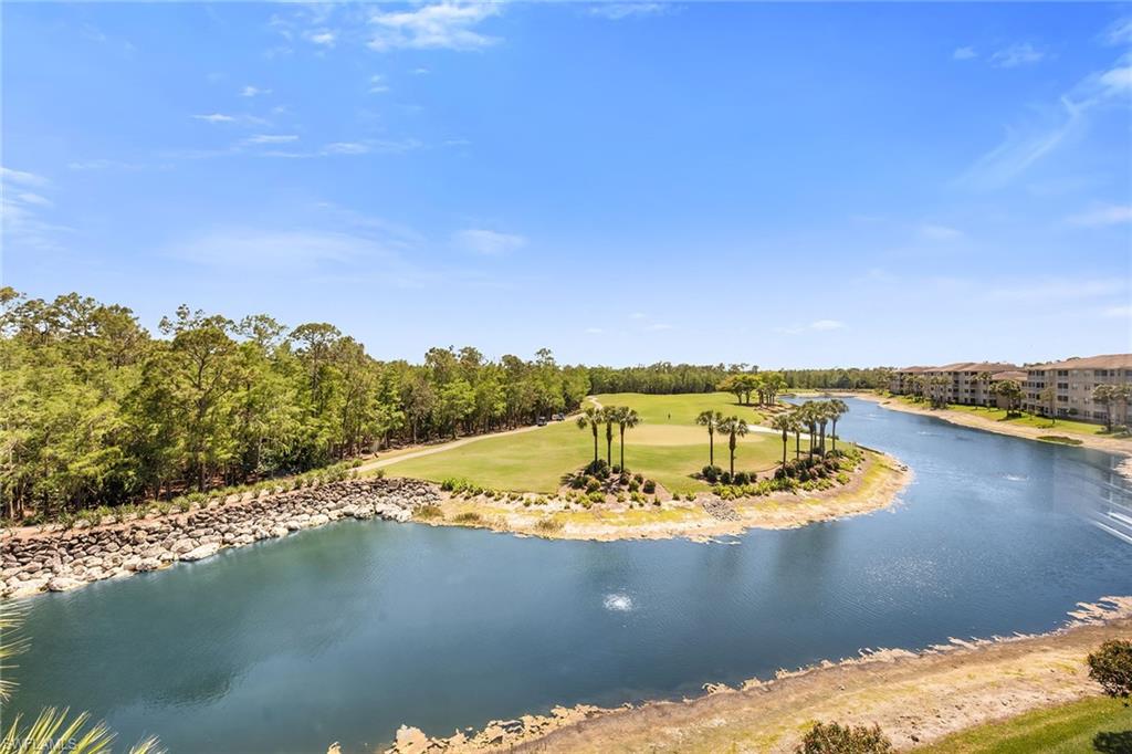 3800 Sawgrass Way, Unit 3142 Naples, FL 34112 - Photo 29 of 50 a view of a lake with an ocean