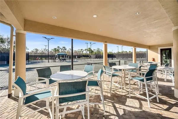 a view of a terrace with chairs