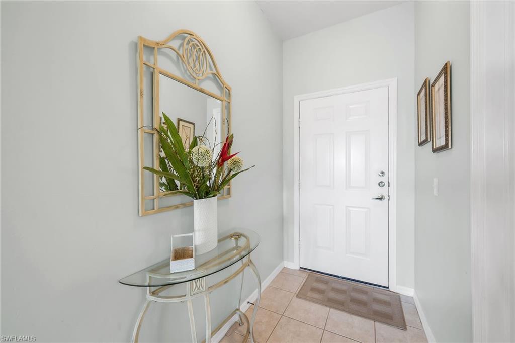 3800 Sawgrass Way, Unit 3142 Naples, FL 34112 - Photo 4 of 50 a vase of flowers sitting on a table