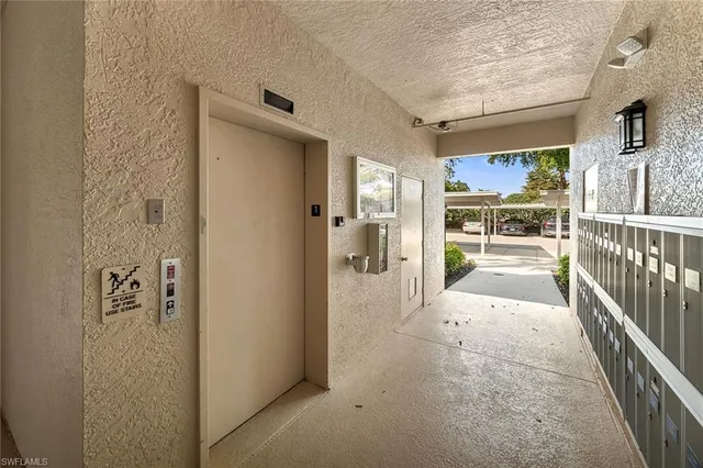 an aerial view of a house with a yard and potted plants