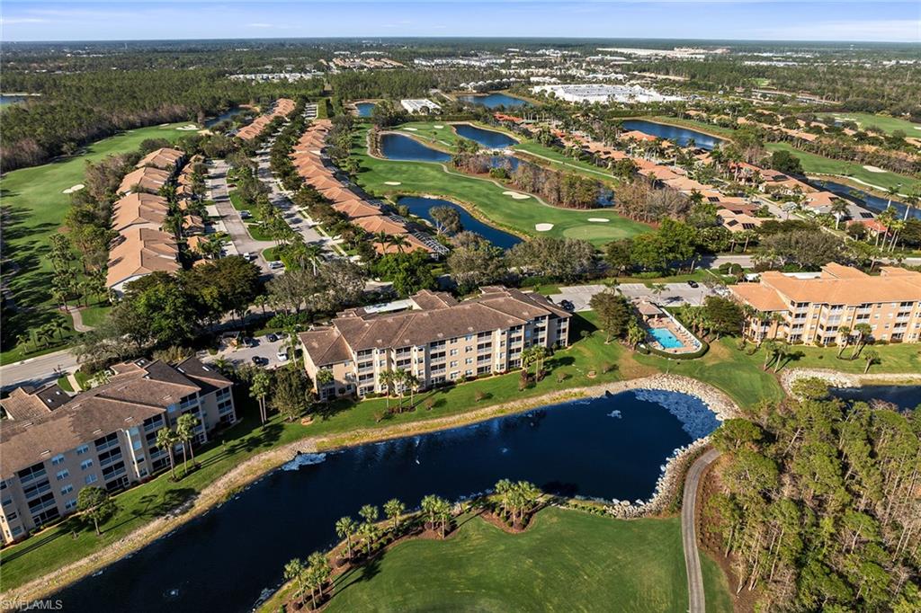 3800 Sawgrass Way, Unit 3142 Naples, FL 34112 - Photo 43 of 50 an aerial view of residential houses with outdoor space