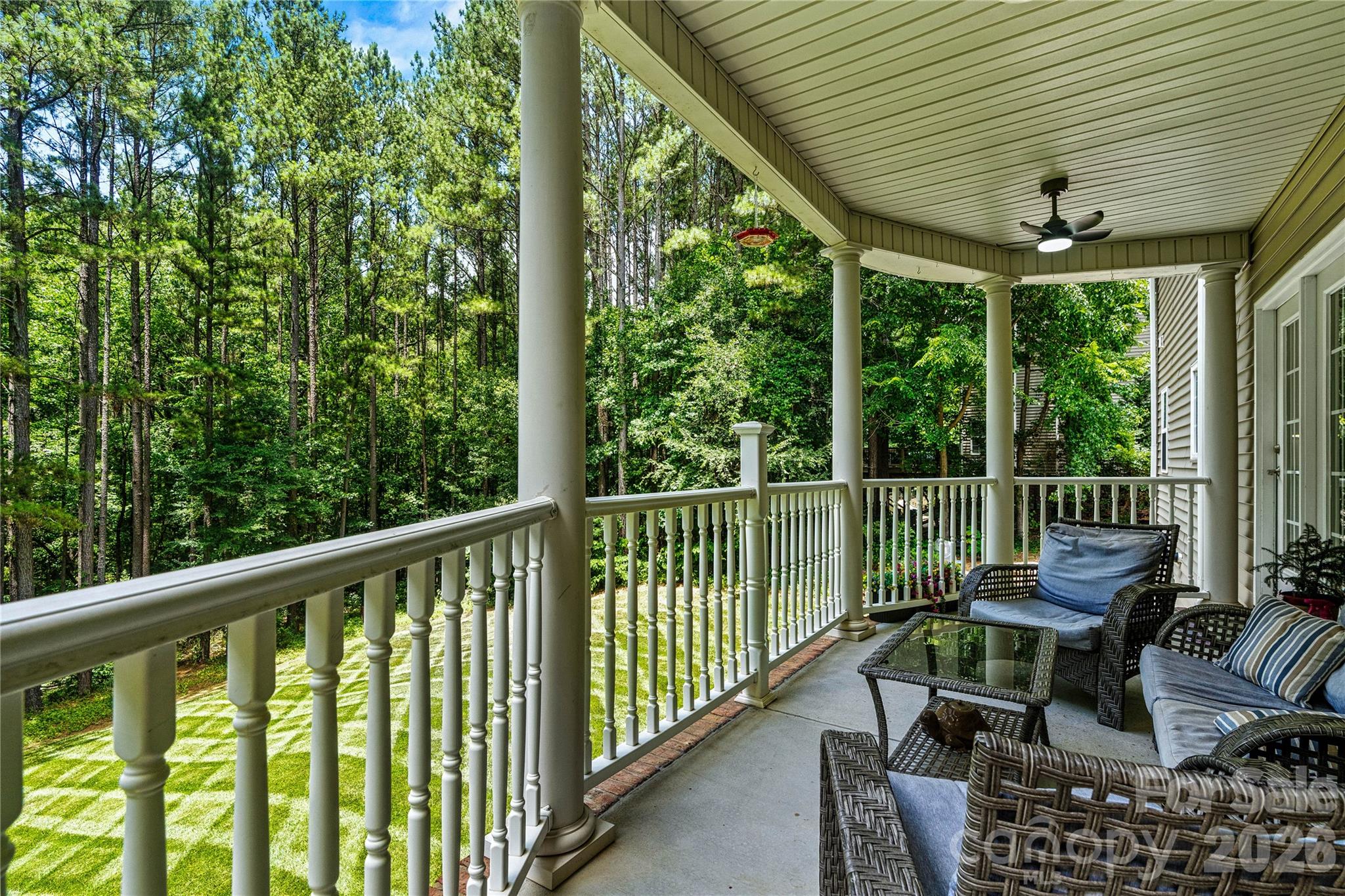 1606 High Ridge Drive Stanley, NC 28164 - Photo 36 of 44 a view of a chair and tables in the balcony
