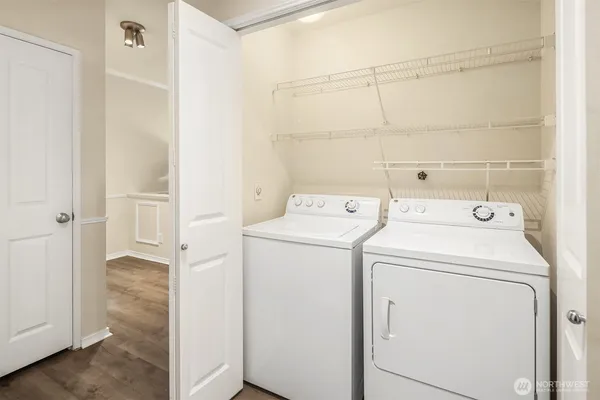 a utility room with dryer and washer