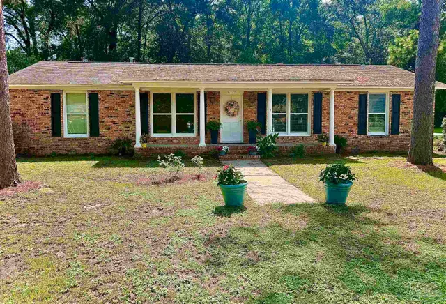 a front view of a house with a porch