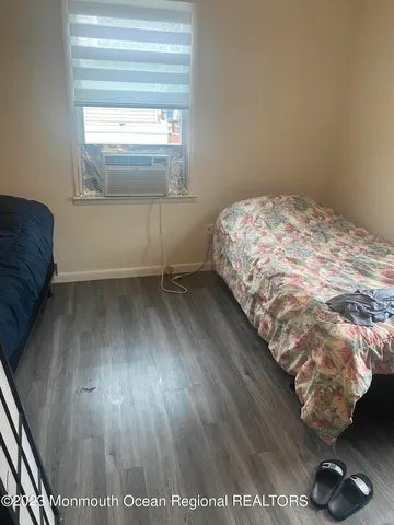a kitchen with a sink cabinets and dining table