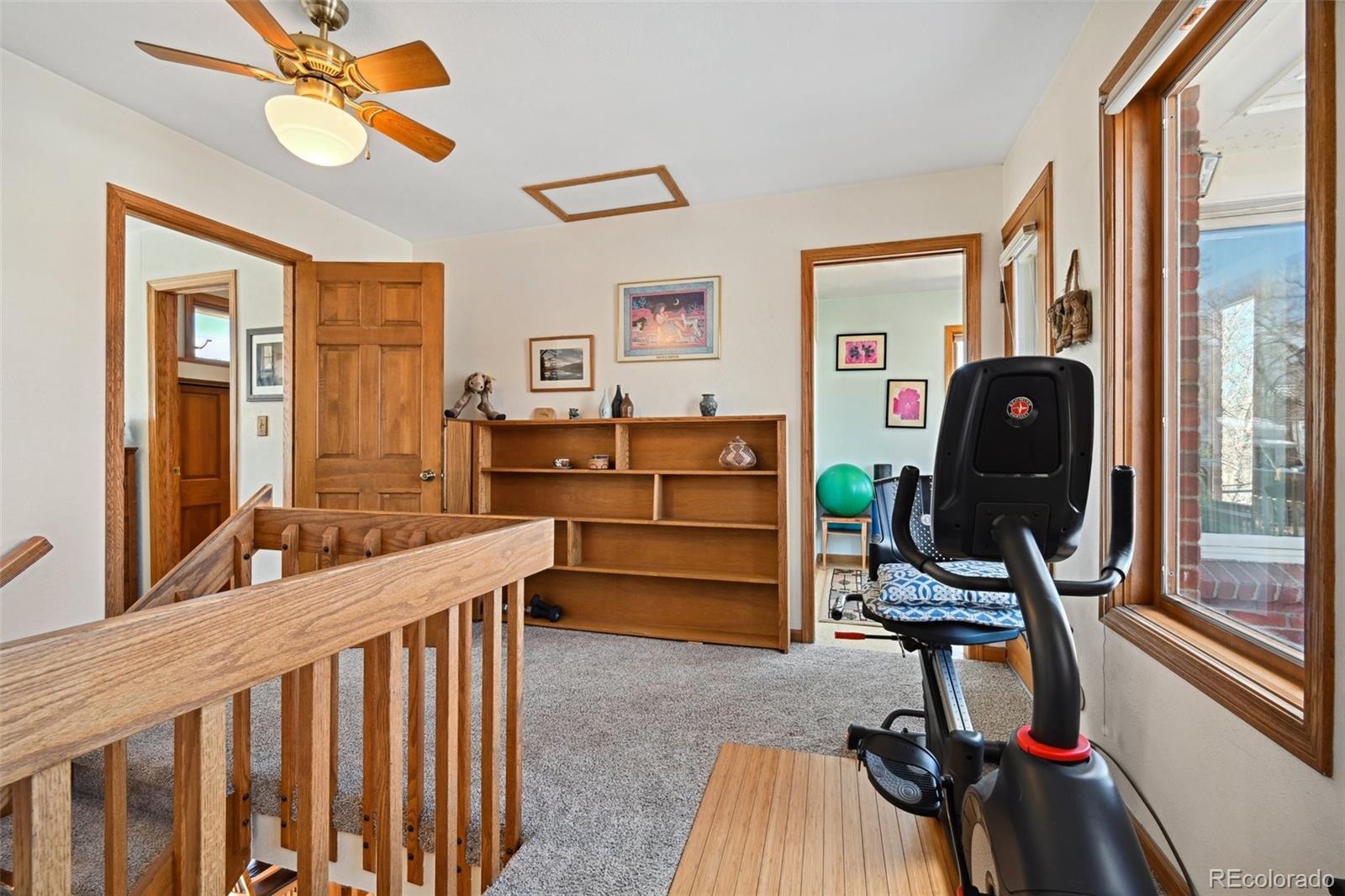 1112 Maple Street Golden, CO 80401 - Photo 18 of 36 a view of a workspace with furniture and a window