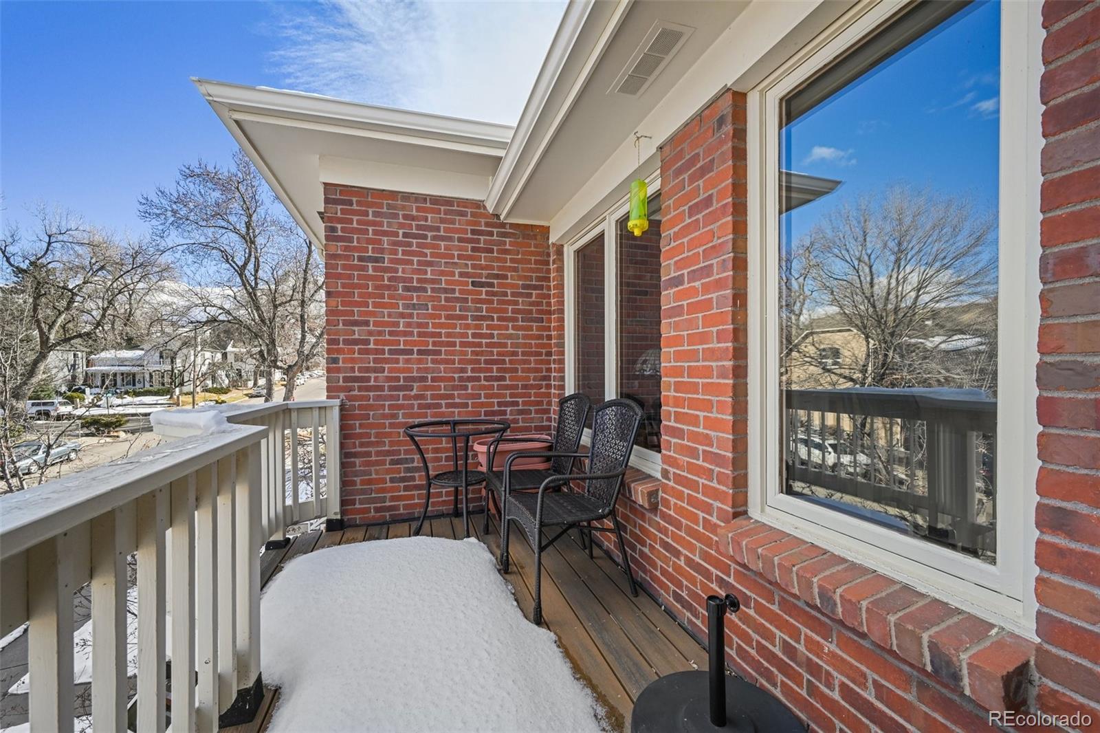 1112 Maple Street Golden, CO 80401 - Photo 24 of 36 a view of a patio with a table and chairs