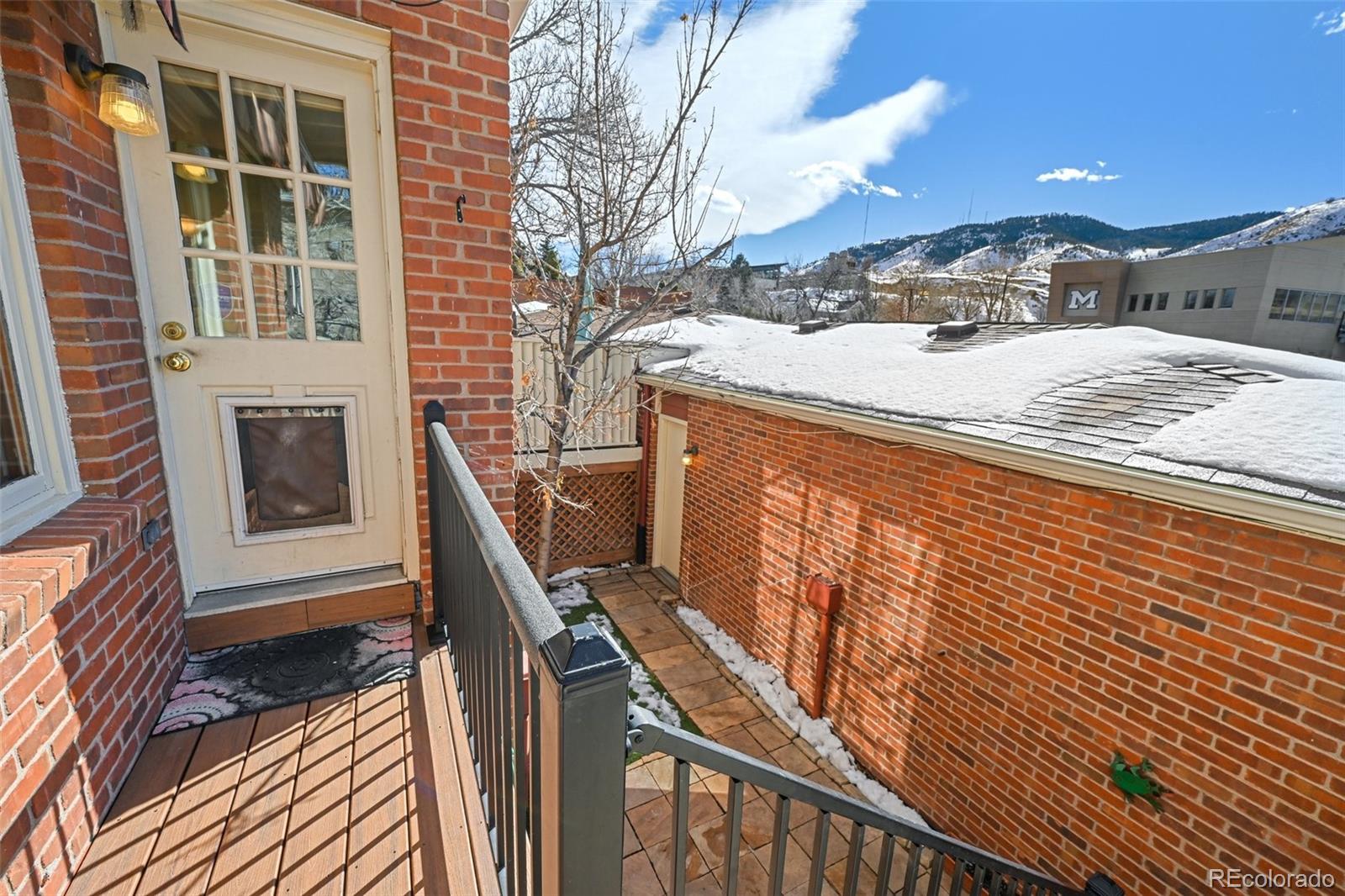 1112 Maple Street Golden, CO 80401 - Photo 25 of 36 a view of a backyard with sitting area