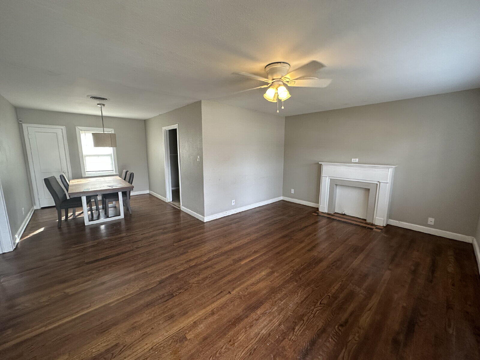 2513 29th Street Lubbock, TX 79410 - Photo 2 of 15 a view of empty room with wooden floor and fan