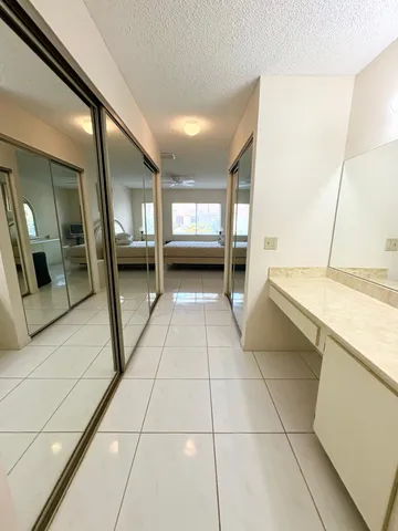 a bathroom with a sink and mirror