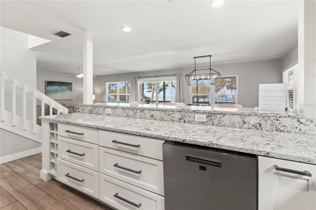 403 North Bay Boulevard Anna Maria, FL 34216 - Photo 20 of 58 a bathroom with a granite countertop double vanity sink and mirror