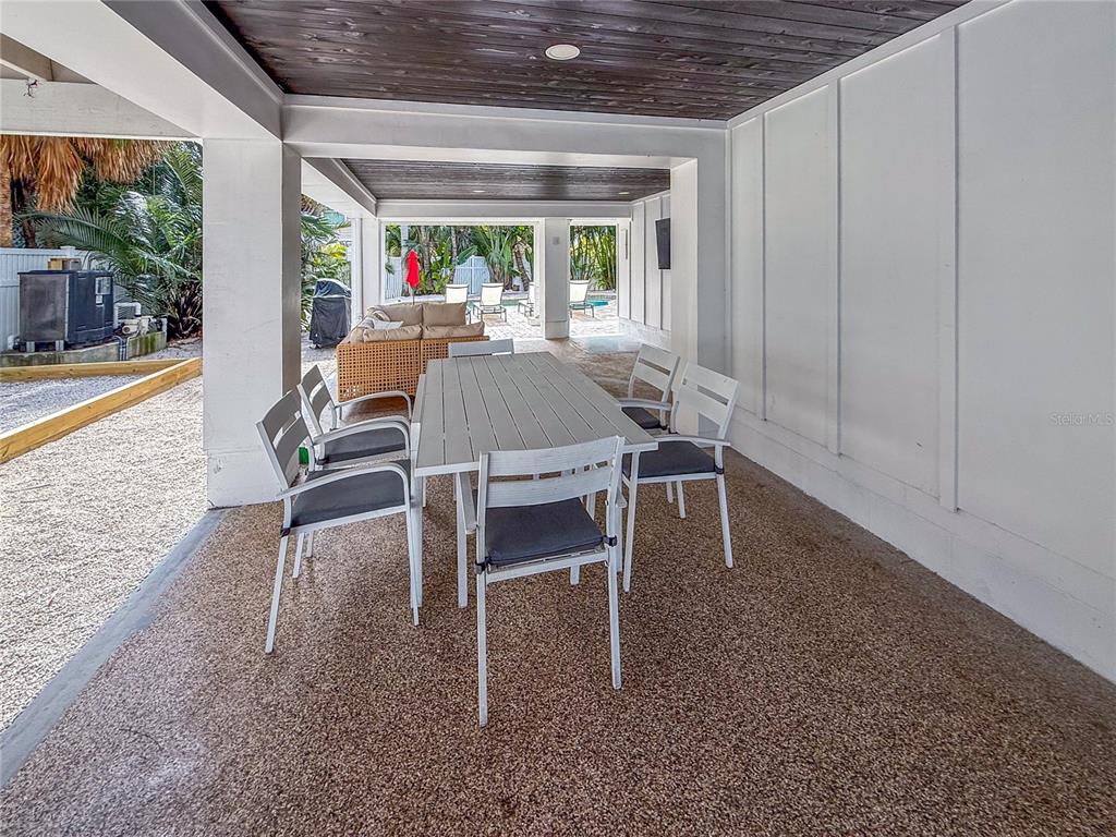 403 North Bay Boulevard Anna Maria, FL 34216 - Photo 44 of 58 a view of a dining room with furniture window and outside view