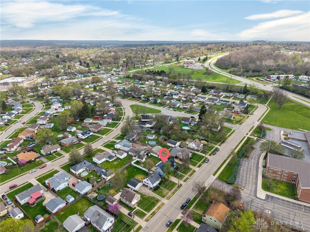 3301 Wildwood Road Middletown, OH 45042 - Photo 67 of 68 An aerial view showcases a vibrant neighborhood with abundant green spaces and winding roads.