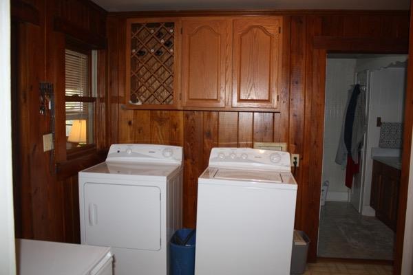 2457 Beacon Light Road Morrison, TN 37357 - Photo 11 of 18 Laundry room with cabinets for extra storage plus a built in ironing board