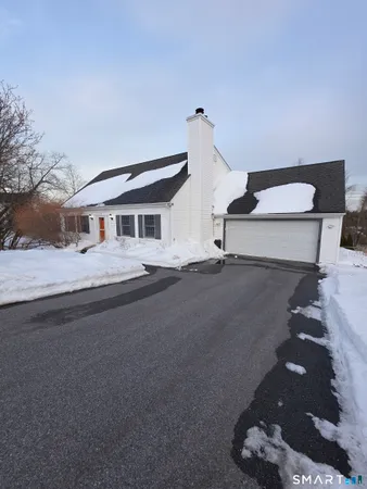 a house view with a outdoor space