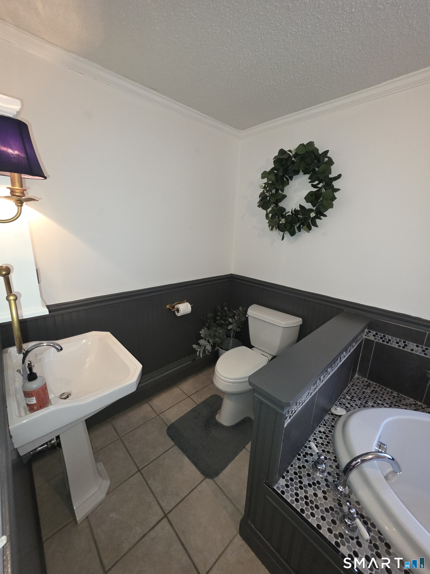 83 Chelsea Court Torrington, CT 06790 - Photo 32 of 39 a bathroom with a sink and a toilet