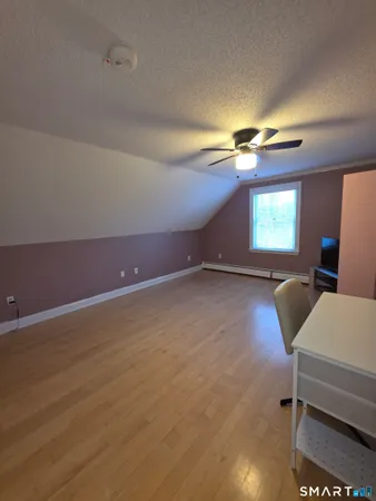 a room with furniture and window