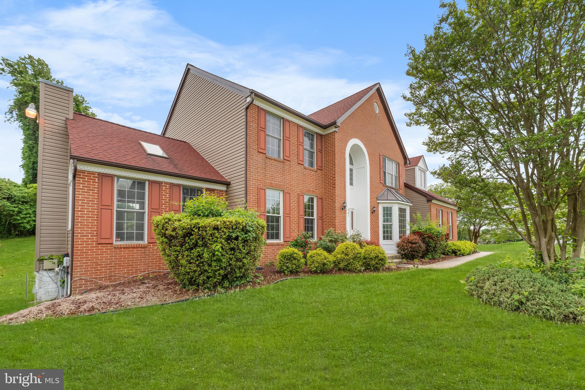 601 James Ridge Road Bowie, MD 20721 - Photo 21 of 77 a front view of a house with garden