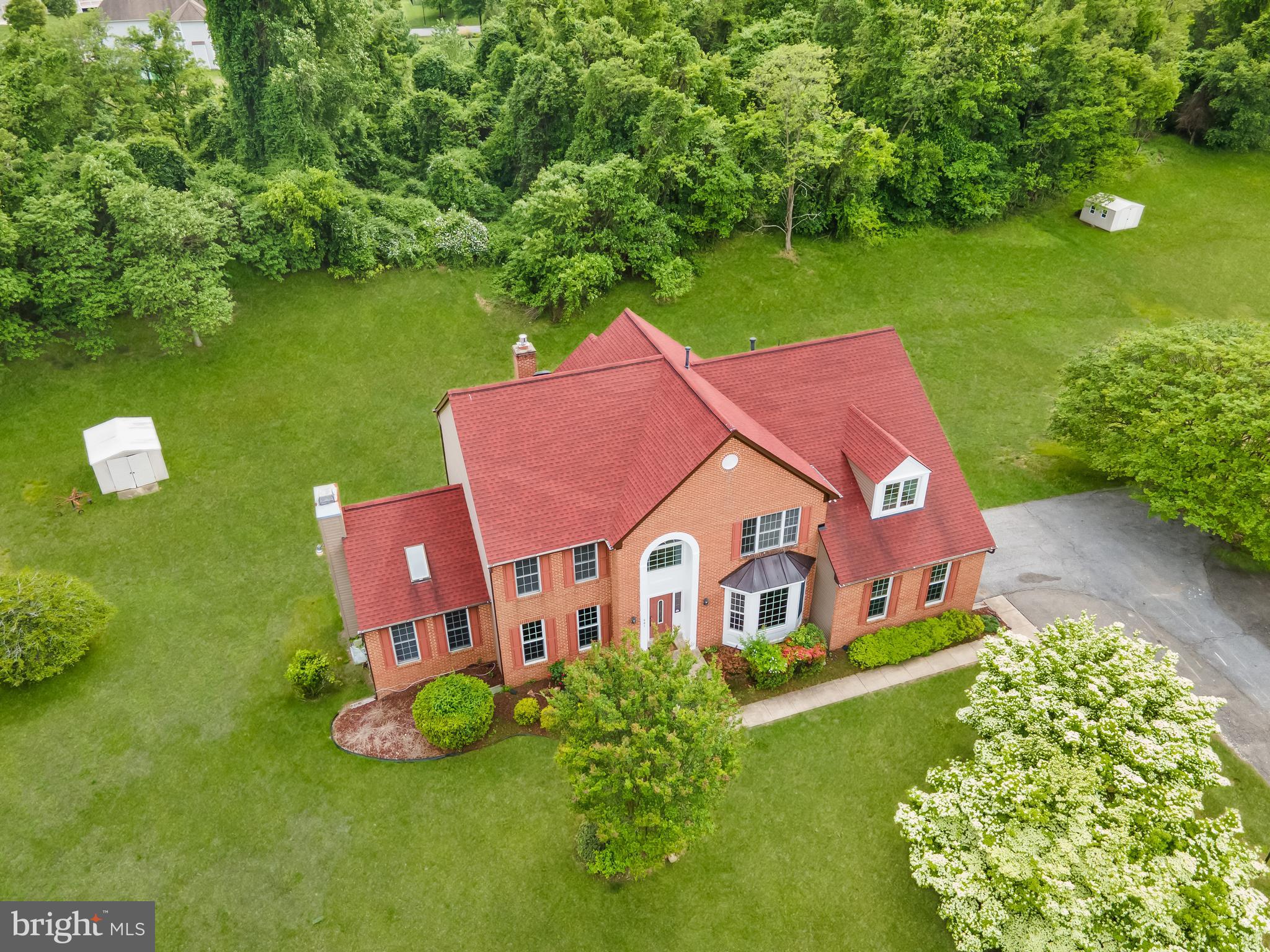 601 James Ridge Road Bowie, MD 20721 - Photo 4 of 77 an aerial view of a house with swimming pool garden and patio