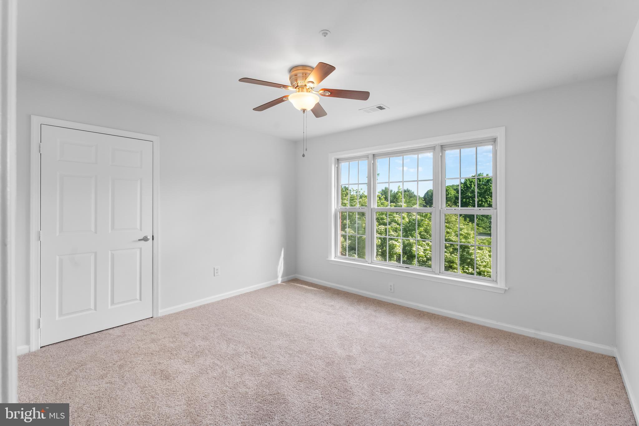 601 James Ridge Road Bowie, MD 20721 - Photo 53 of 77 a view of a livingroom with a ceiling fan and window