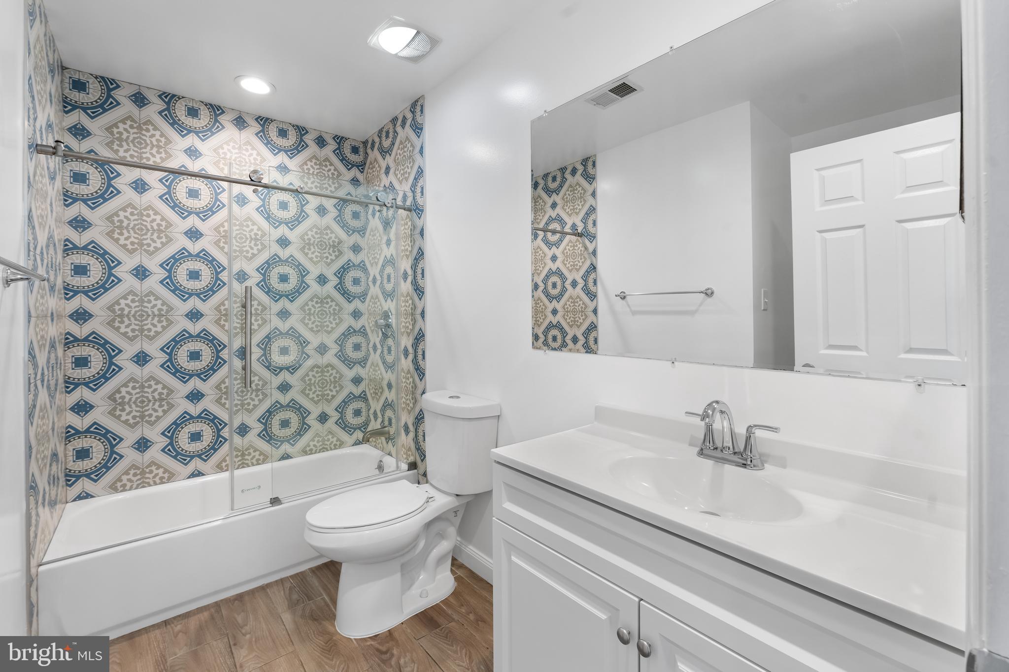 601 James Ridge Road Bowie, MD 20721 - Photo 55 of 77 a bathroom with a sink toilet and shower