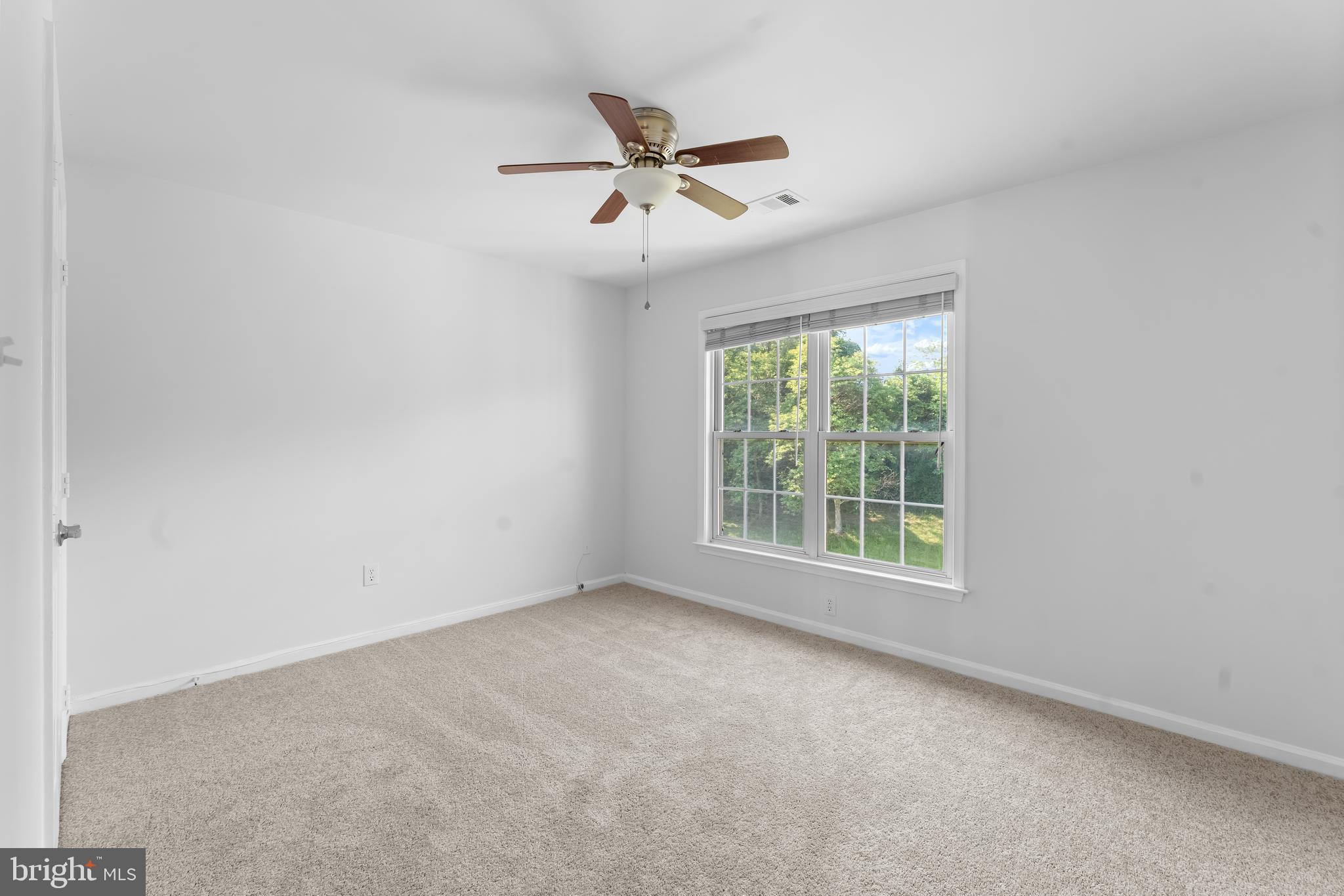 601 James Ridge Road Bowie, MD 20721 - Photo 58 of 77 a view of an empty room with a window