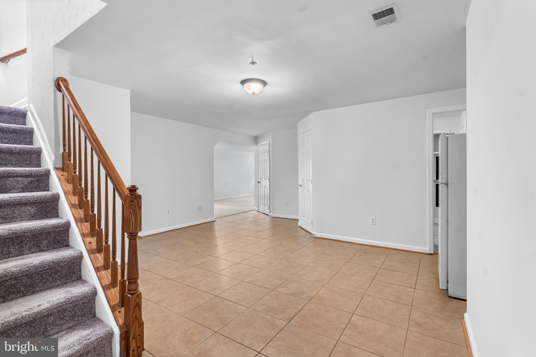 601 James Ridge Road Bowie, MD 20721 - Photo 60 of 77 a view of an entryway with wooden floor