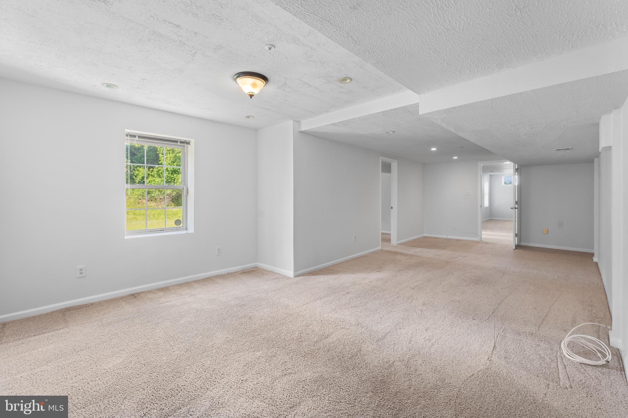 601 James Ridge Road Bowie, MD 20721 - Photo 65 of 77 a view of an empty room with a window