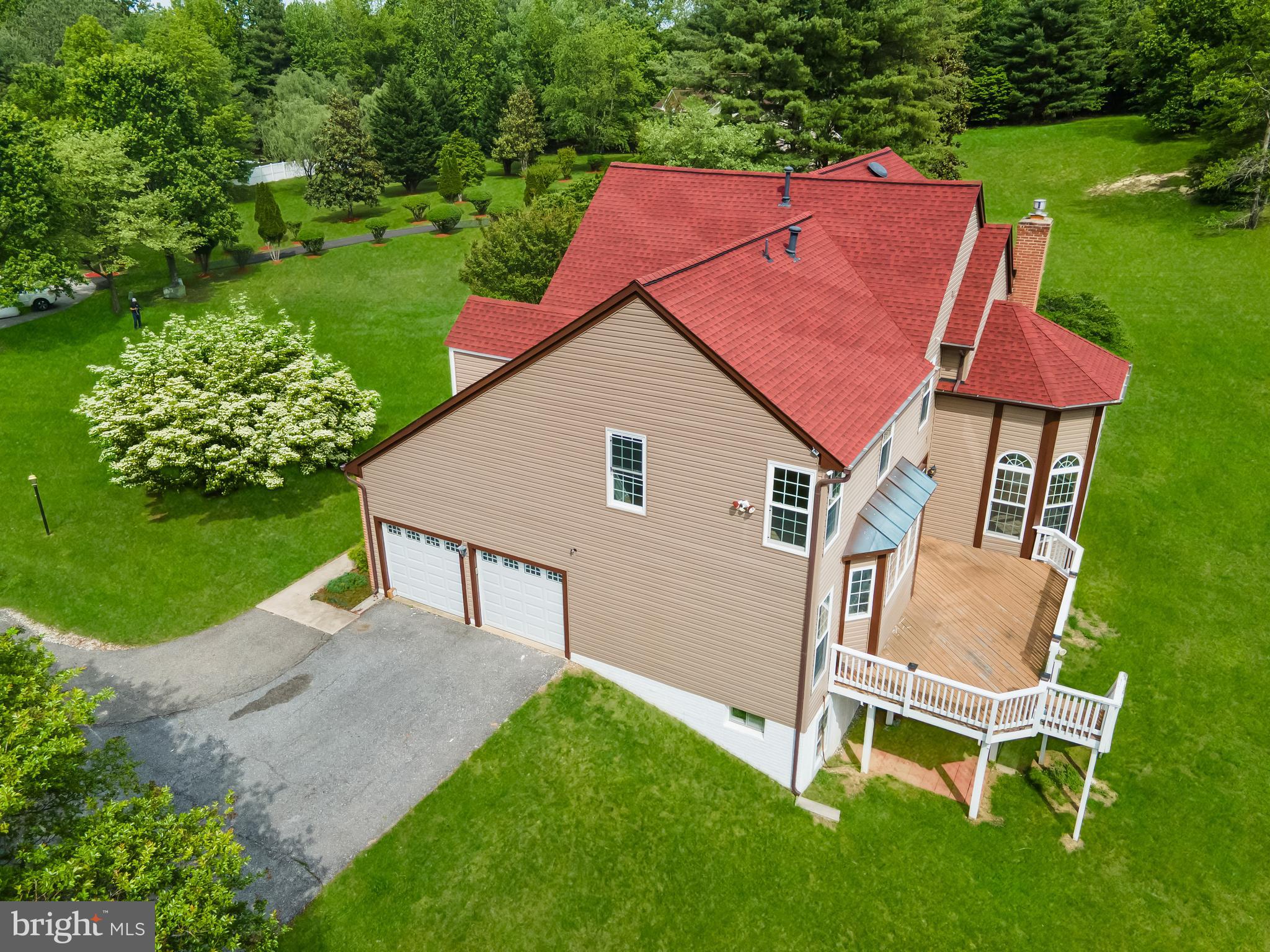 601 James Ridge Road Bowie, MD 20721 - Photo 8 of 77 a backyard of a house with table and chairs