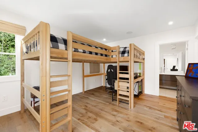 a view of a livingroom with furniture and workspace