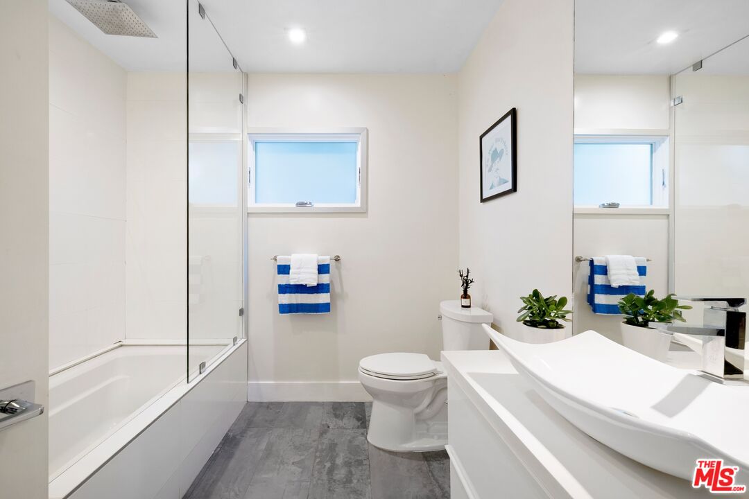 967 Vernon Avenue Venice, CA 90291 - Photo 16 of 22 a bathroom with a sink a toilet and shower