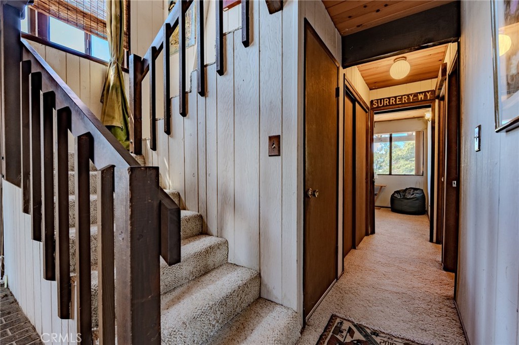 27380 Deertrail Drive Tehachapi, CA 93561 - Photo 31 of 47 a view of a hallway with wooden floor and entryway