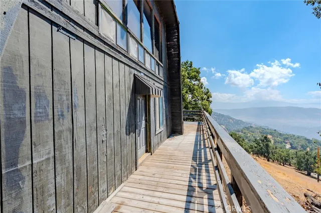 a view of balcony and yard