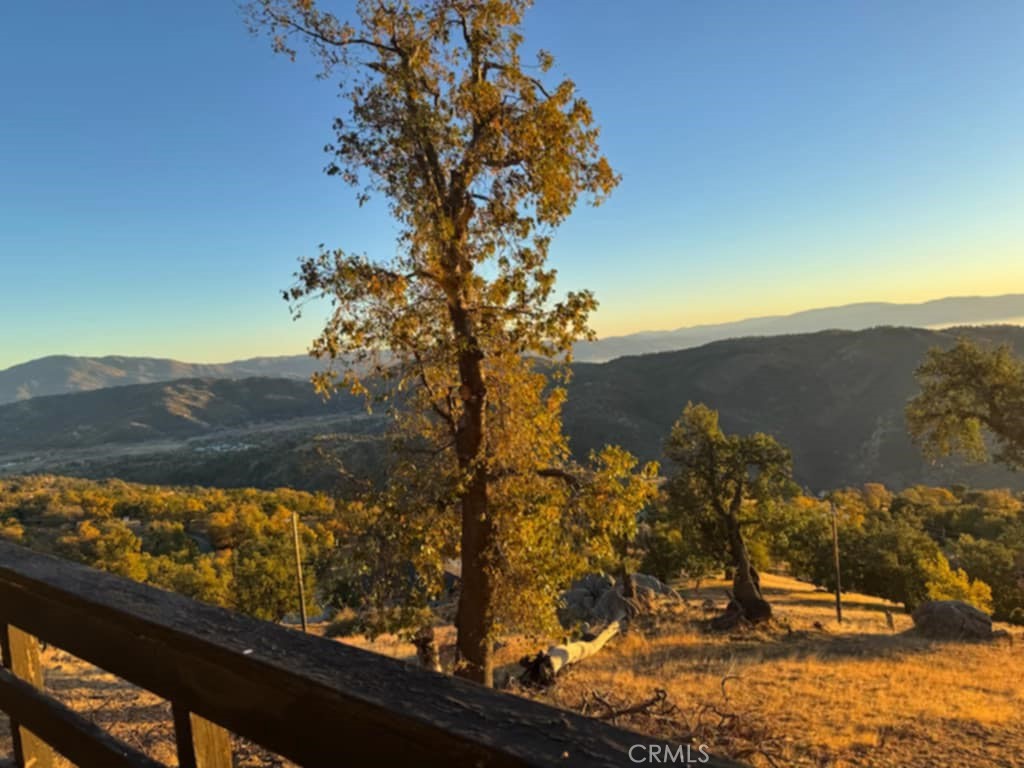 27380 Deertrail Drive Tehachapi, CA 93561 - Photo 7 of 47 a view of a lake from a balcony