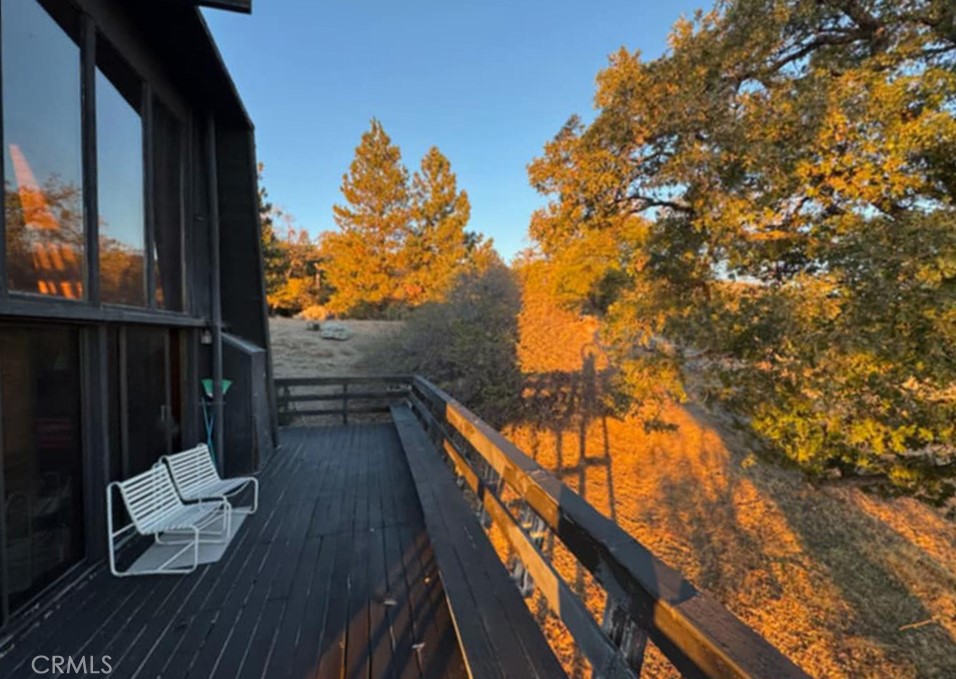 27380 Deertrail Drive Tehachapi, CA 93561 - Photo 9 of 47 a view of balcony with wooden floor and fence