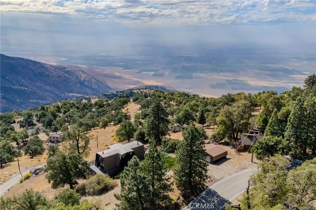 a view of a yard with an outdoor space