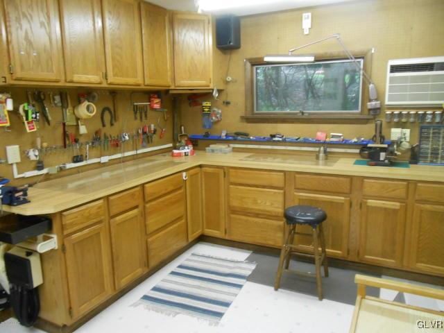 3497 Spruce Cabin Road Cresco, PA 18326 - Photo 13 of 22 a bathroom with a sink and a mirror